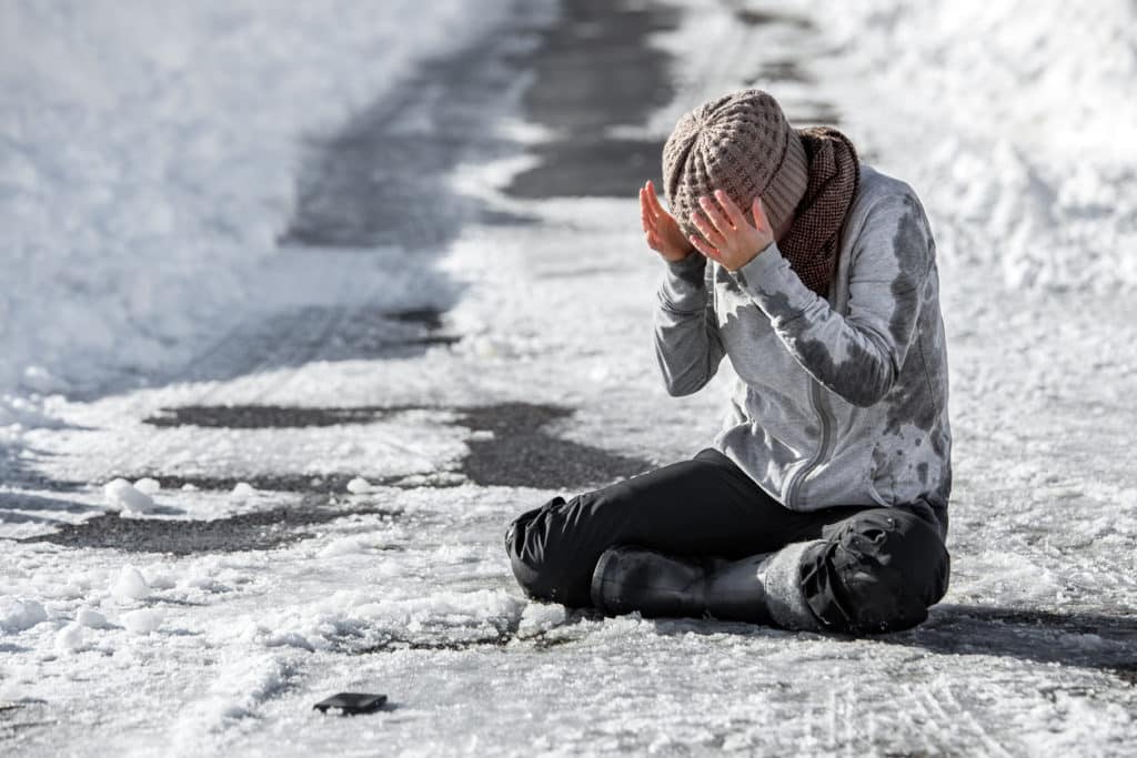 Woman slipped on the winter road