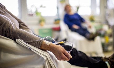 a woman getting fluid transfusion