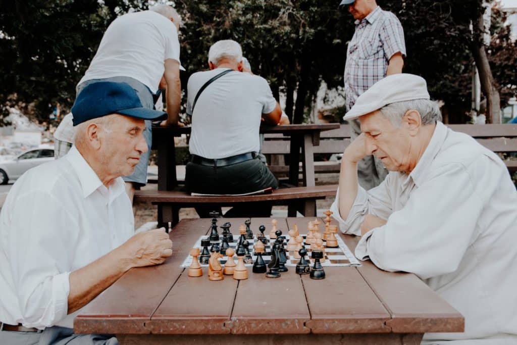 seniors playing chess game