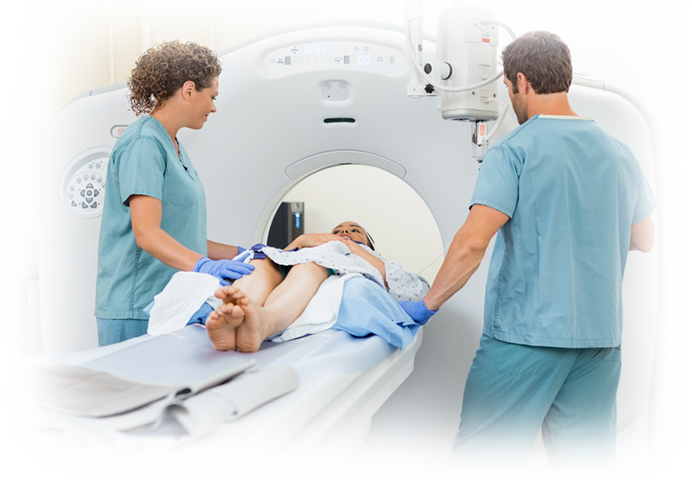 nurses putting a patient in an MRI