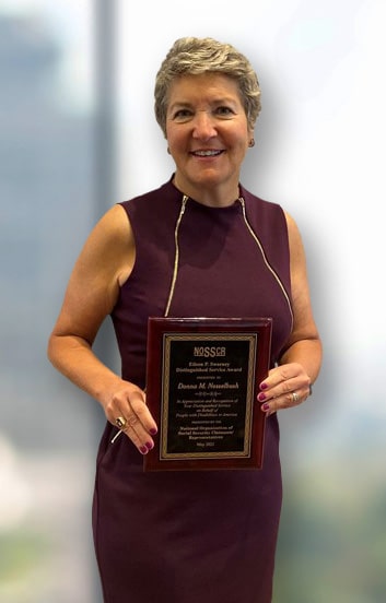 Donna Nesselbush receives an award