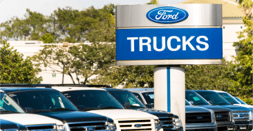 a car park consisting Ford cars