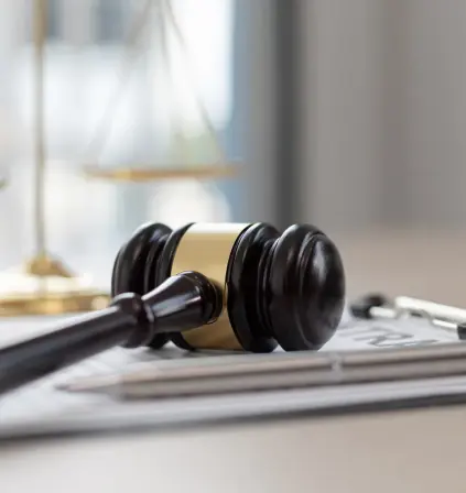 a gavel placed on a document