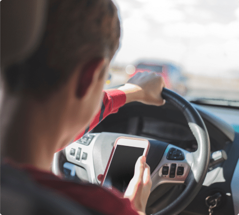 a person texting and driving