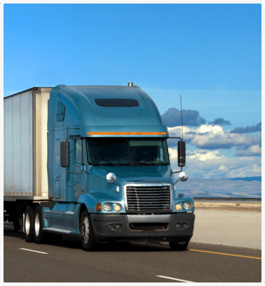 a truck driving on a road