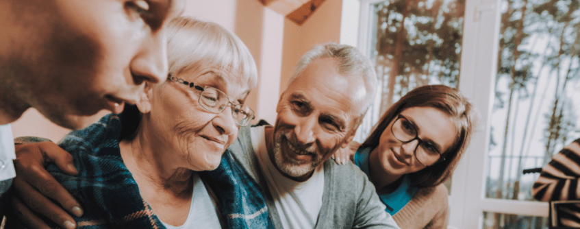 a family talking to their grandma