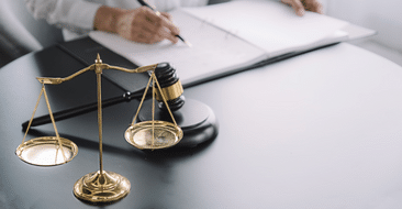 a lawyer sitting at a table