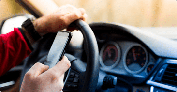 a person texting and driving