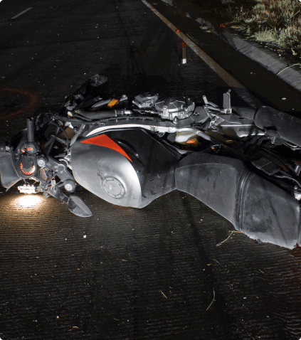 a motorcycle on its side