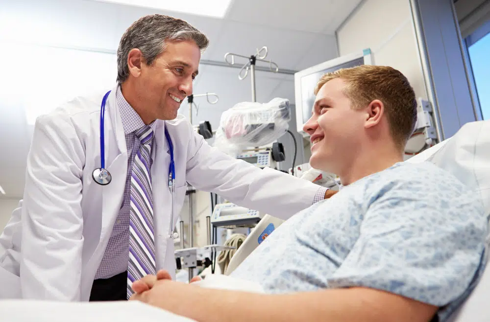 a doctor talks to a patient who was in a car accident