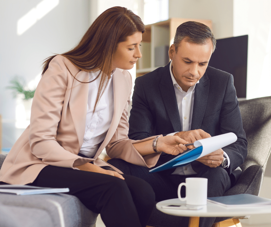 a lawyer talking with a client about her case