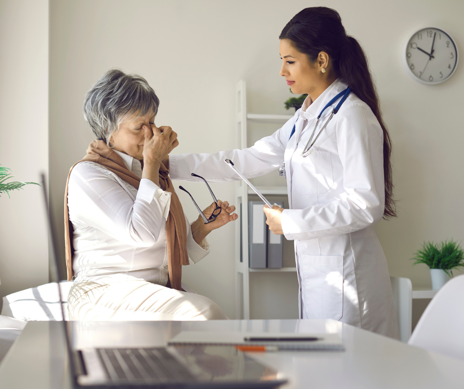 a doctor talking to a patient with vision problems