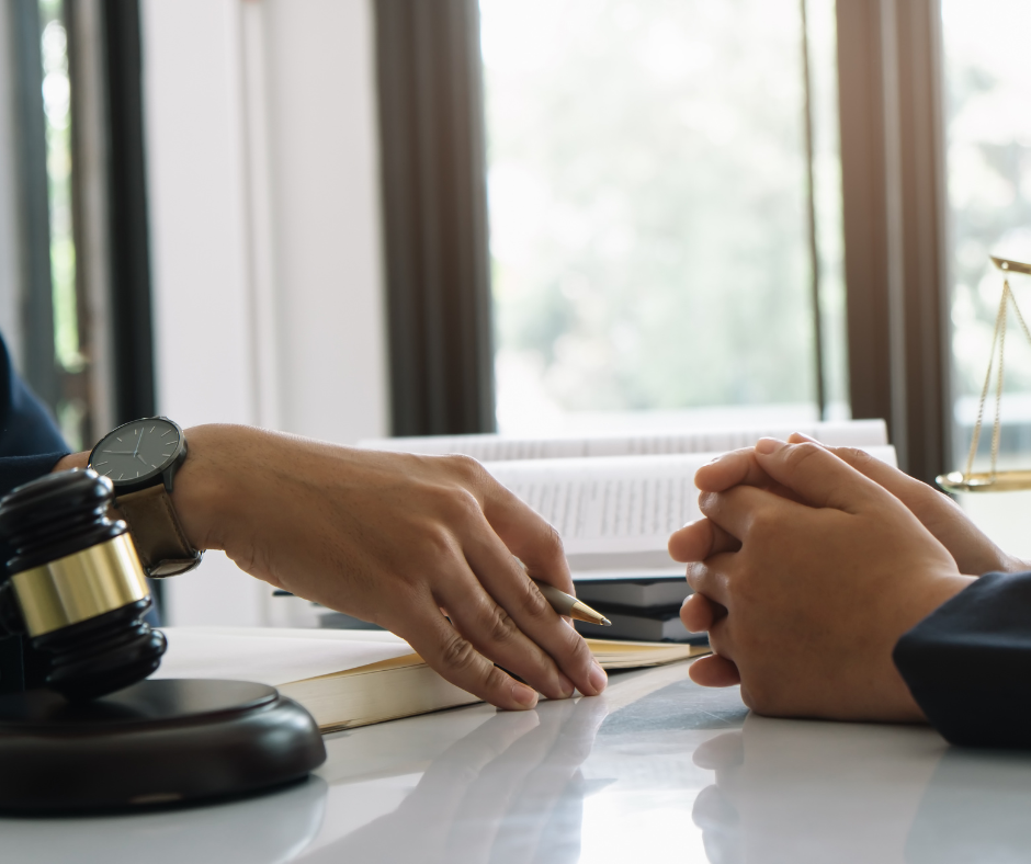 a person talking to a lawyer