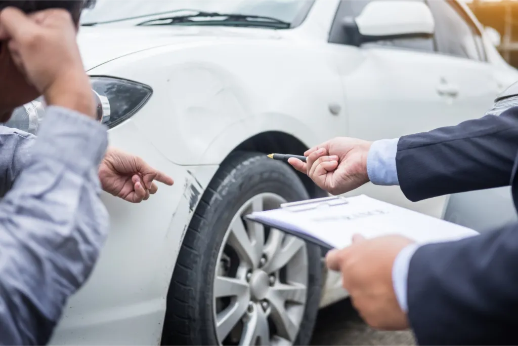A person speaking with a lawyer in a consultation setting.