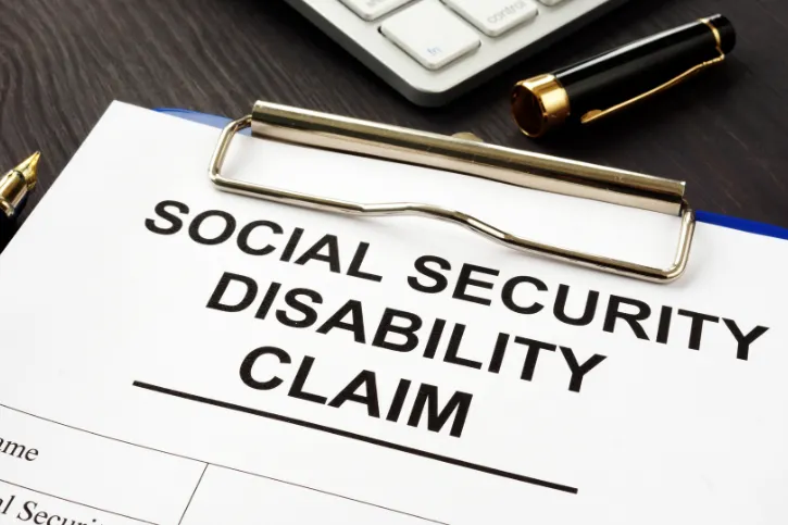 A close-up of a social security disability claim form.