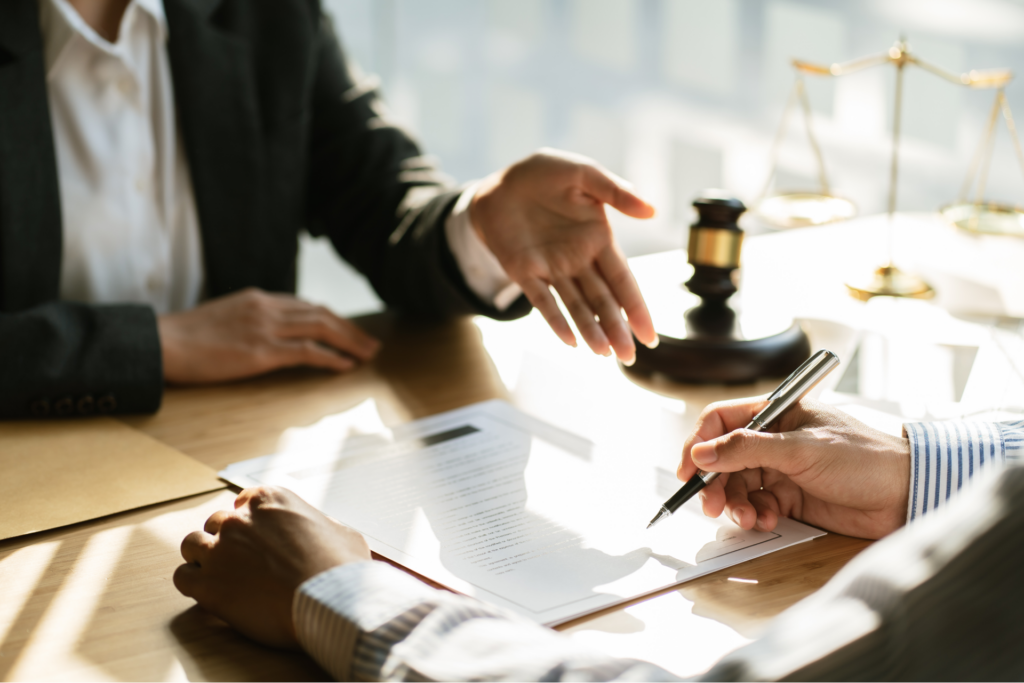 Image featuring legal professionals in a meeting.