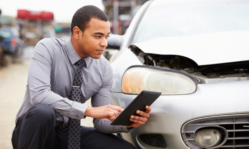 A law firm promotional image featuring a legal consultation.
