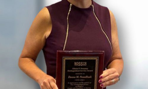 Donna Nesselbush receives an award