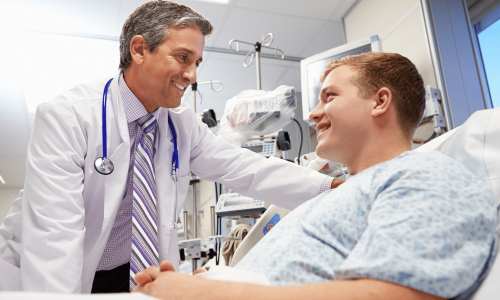 a doctor talks to a patient who was in a car accident