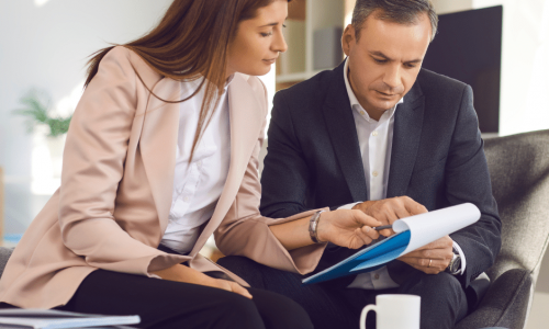 a lawyer talking with a client about her case