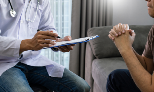 a person talking to a doctor in rhode island after a back injury