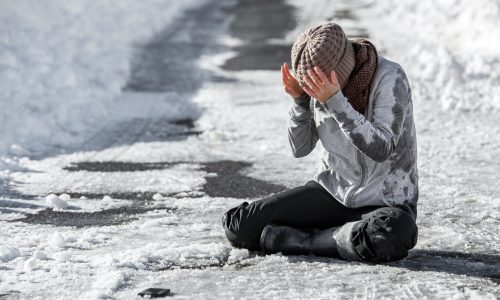 Woman slipped on the winter road