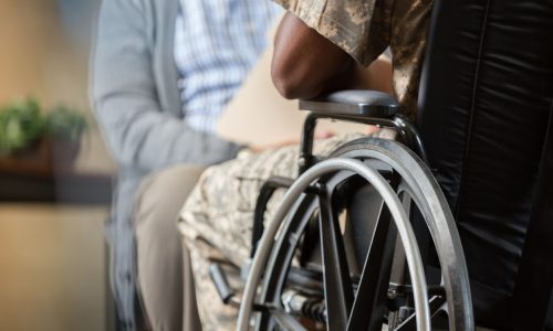 Injured veteran talks with psychiatrist
